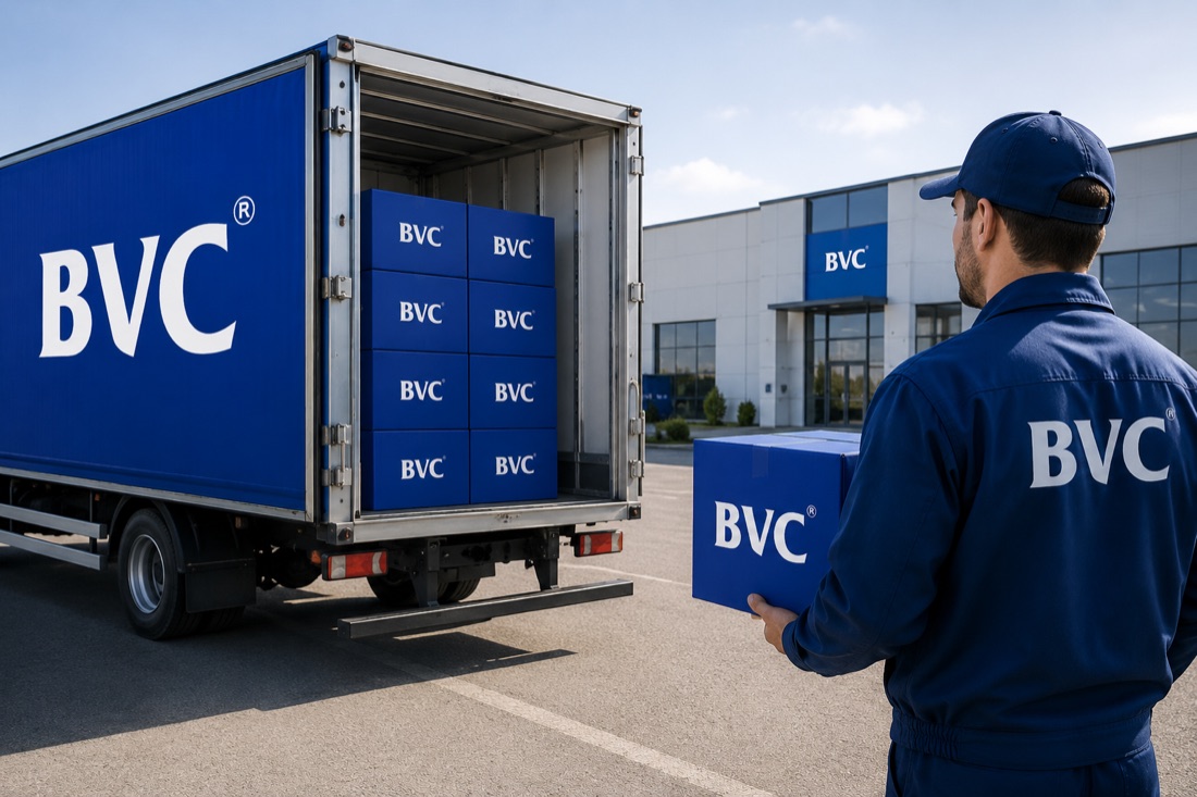 BVC courier carrying a sealed BVC parcel from a loaded truck outside a BVC facility